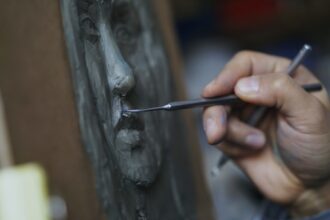 Photo friction sculpting
